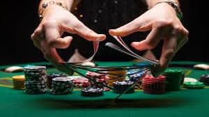 Filipino player spinning slot reels on a mobile phone with bwinph interface